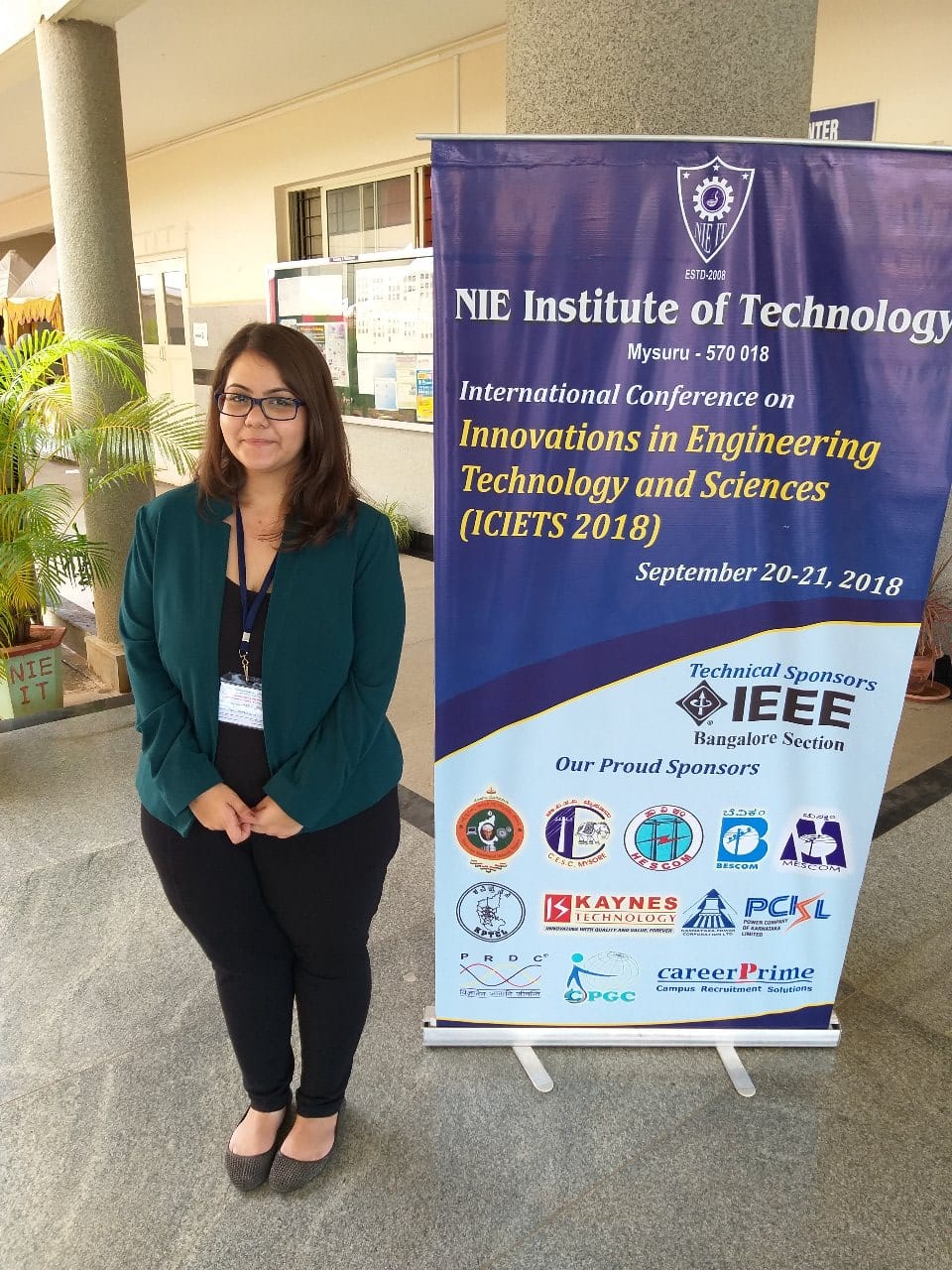 Afreen Bhumgara speaking on stage at TEDx Lakhota Lake